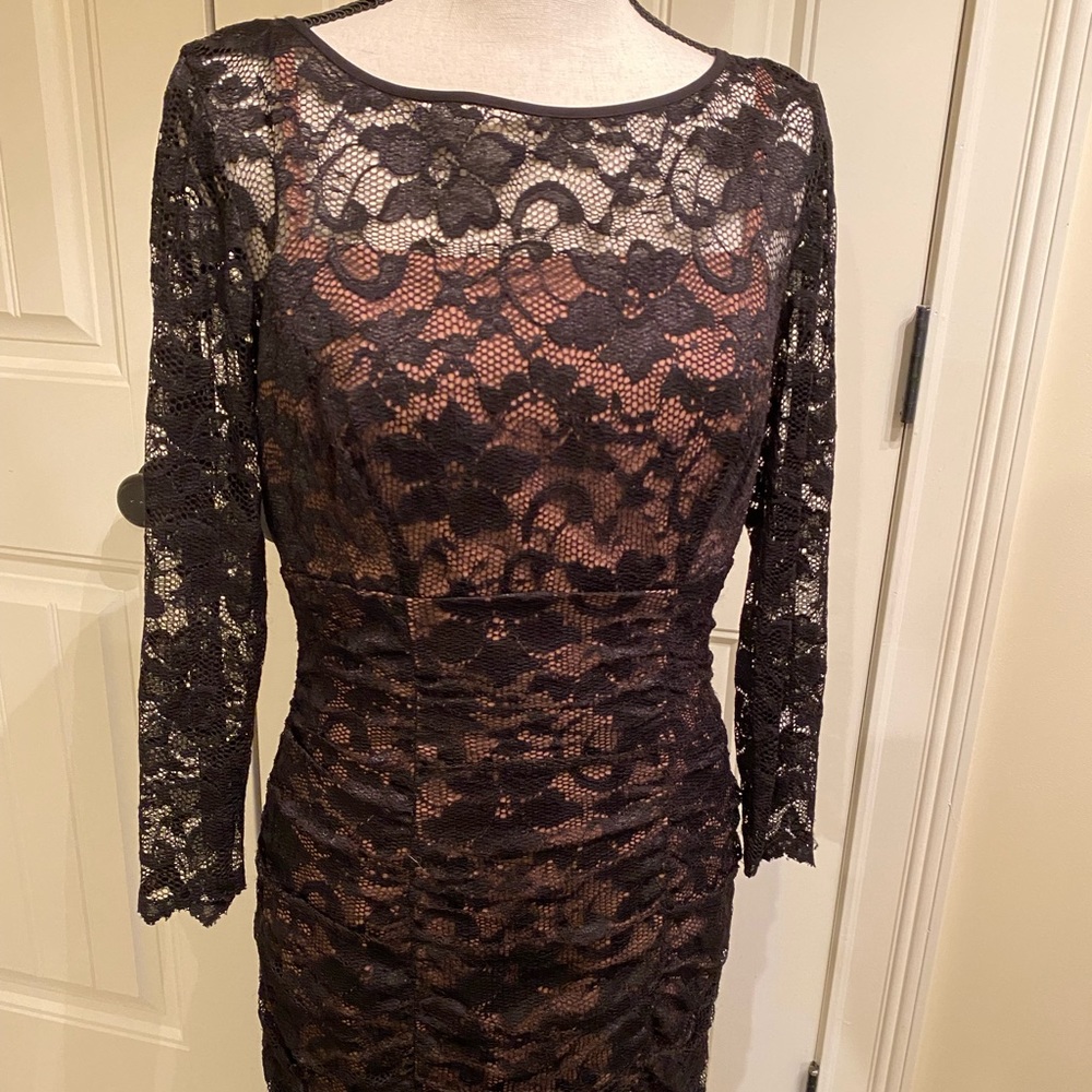 Holiday, New Years Eve perfect dress! Lace overlay with nude lining.